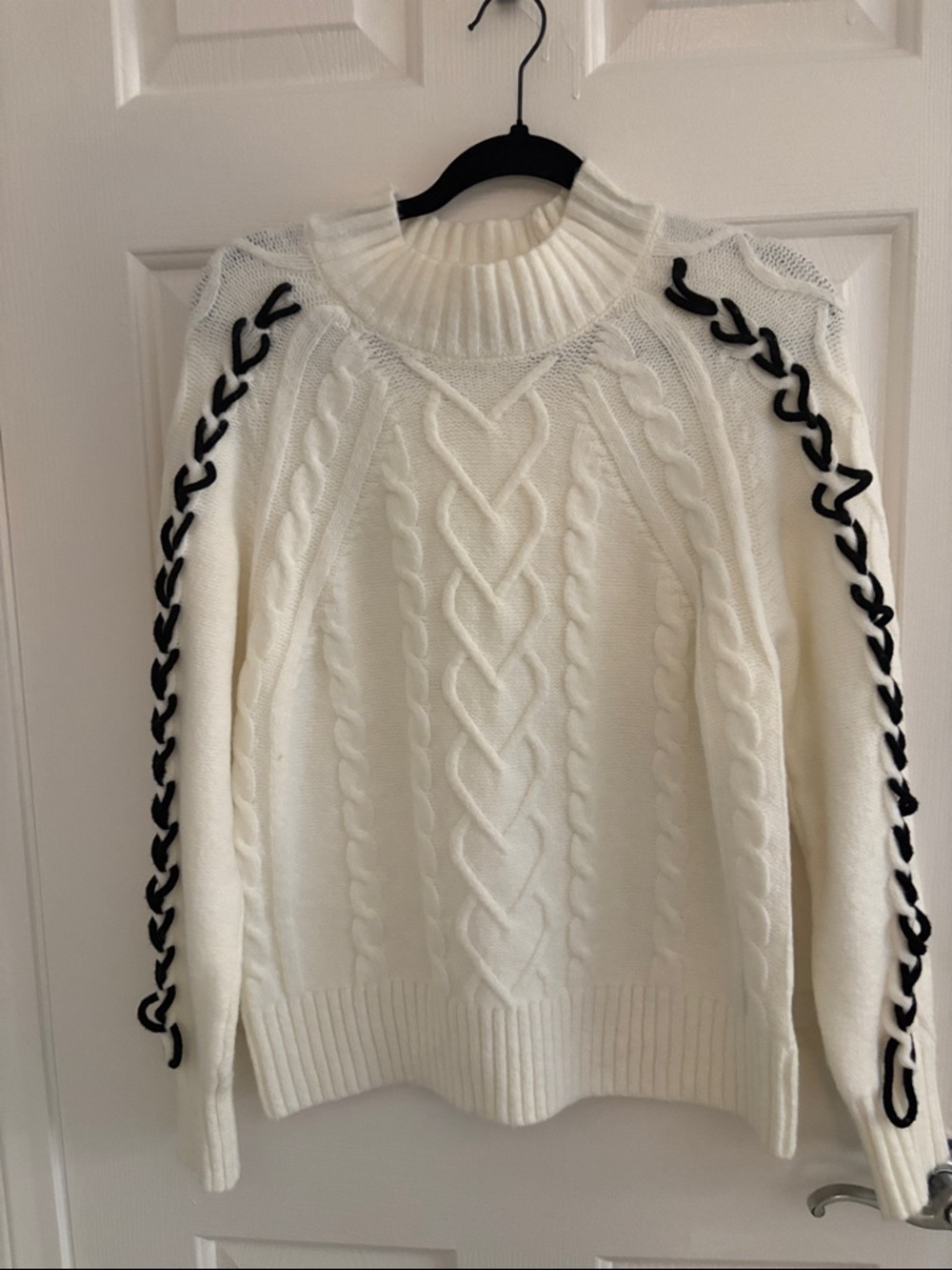Cream Cable-Knit Turtleneck Sweater with Black Lace-Up Detail